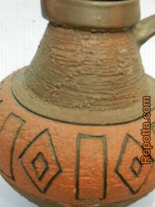 red pottery vase chamotte