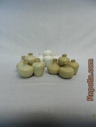 5 dicus shaped vases together SOLD