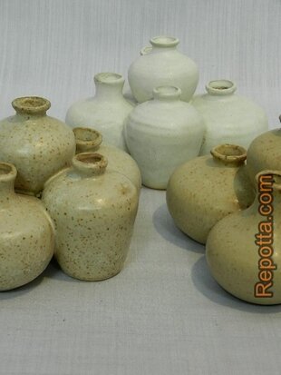 5 dicus shaped vases together SOLD