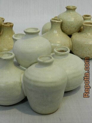 5 dicus shaped vases together SOLD