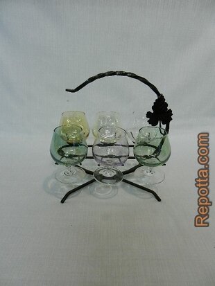 6 colored glasses in a glass caddy SOLD