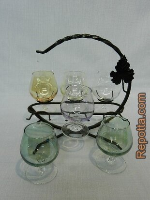 6 colored glasses in a glass caddy SOLD