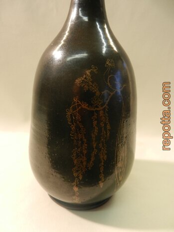 signed bottle vase with peacock on branch